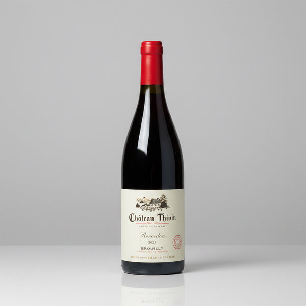 Bottle of Château Thivin Brouilly Reverdon 2023 on plain background