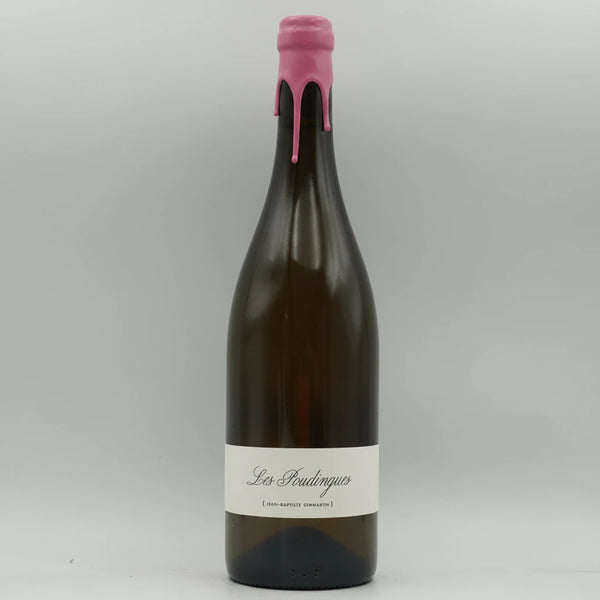 A dark brown glass bottle of wine with a pink cap and a white label reading Domaine Lajibe Les Poudingues 2022/23/24 on a light gray background.