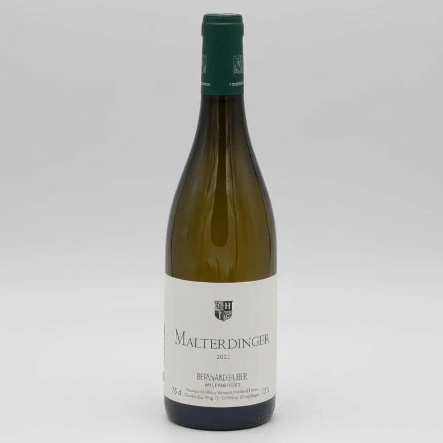 Chalky, precise organic German Chardonnay with citrus zest, white pear, saline grip, and refined oak; Malterdingen terroir, 2022 Huber, mineral and focused.