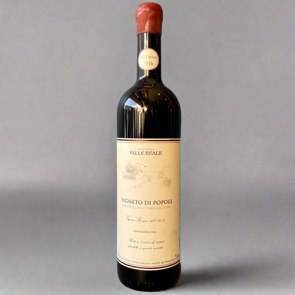 Bottle of Valle Reale Montepulciano d’Abruzzo with deep ruby colour, showcasing Abruzzo’s mountain terroir and rich dark fruit flavours.